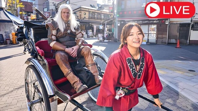 Cute Japanese Girl Carries The Witcher Through Tokyo