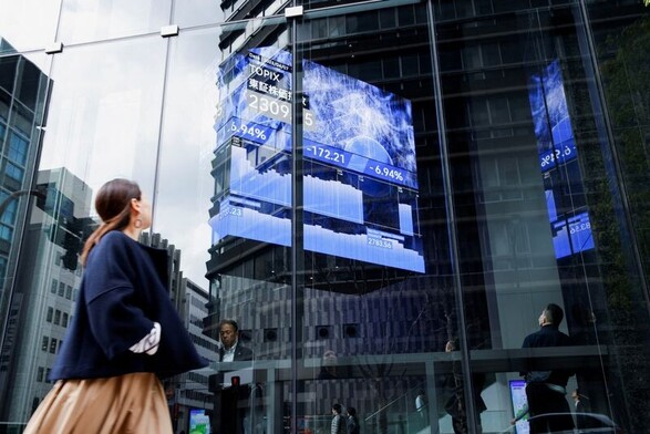 Japan's Nikkei trades higher as iPhone-related stocks jump