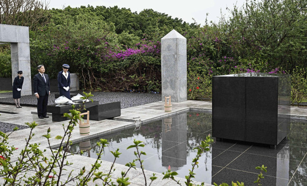 Japan emperor explores his symbolic role in trips to mourn war dead