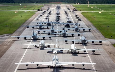 Dozens of American warplanes roll out in Pacific show of strength on Okinawa