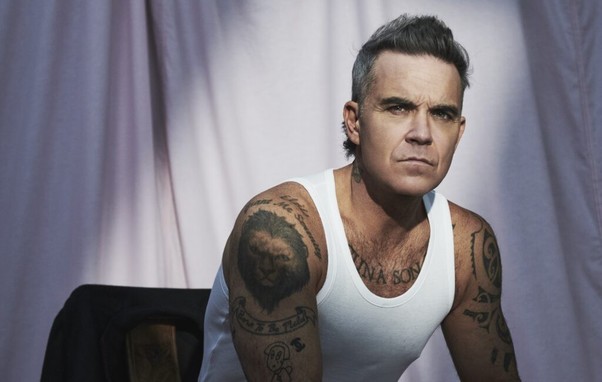 Robbie Williams announces new album 'BRITPOP', shares blistering single with Black Sabbath's Tony Iommi