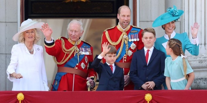 Three generations of the Royal Family watch flypast on Buckingham Palace balcony