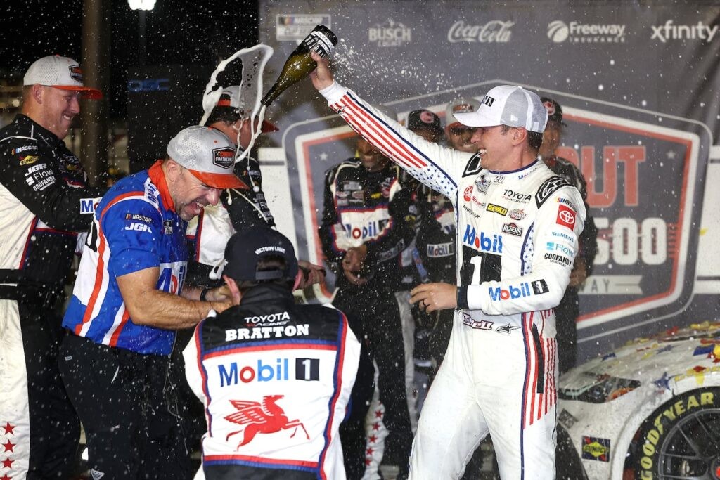 After seven runner-up finishes this season, Christopher Bell (right) finally got to spray the bubbly in victory lane after winning Sunday's Southern 500 at Darlington, dousing his crew chief, Adam Stevens, as well.